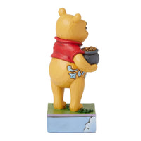 Jim Shore Disney Traditions Pooh With Clover & Pot - Lucky Oi' Bear